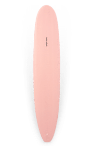 Shapers-Club- Une planche de surf rose sur fond blanc. -surfshop-surfboard